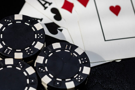 Casino chips and cards on the table. Poker gambling conceptの写真素材