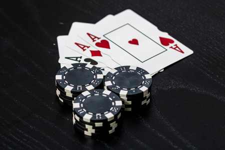 Casino chips and cards on the table. Poker gambling conceptの写真素材