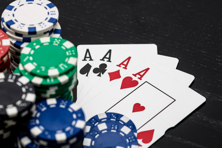 Casino chips and cards on the table. Poker gambling conceptの写真素材