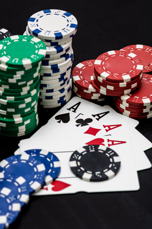 Casino chips and cards on the table. Poker gambling conceptの写真素材