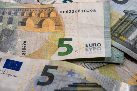 5 EURO banknotes. EUR money background representing savings, income, or investmentの写真素材