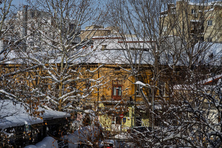 City covered in snow after a heavy snowfall. Urban scene during winterの写真素材