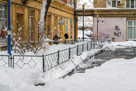 City covered in snow after a heavy snowfall. Urban scene during winterの写真素材