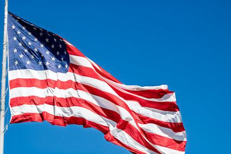American flag waving in the wind. USA flag for Memorial Day or 4th of Julyの写真素材