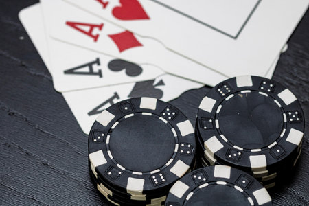 Casino chips and cards on the table. Poker gambling conceptの写真素材