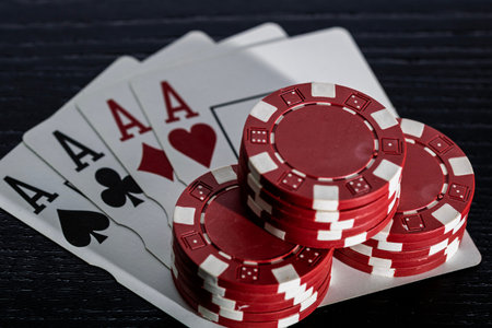 Casino chips and cards on the table. Poker gambling concept