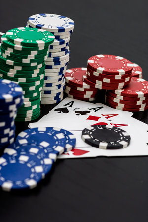 Casino chips and cards on the table. Poker gambling concept
