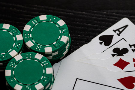 Casino chips and cards on the table. Poker gambling conceptの写真素材