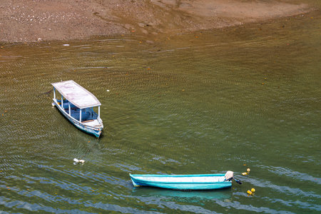 Artisanal fishing boats at the coast of Golfito. Costa Ricaの写真素材