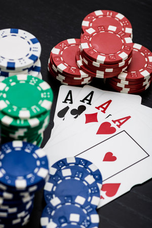 Casino chips and cards on the table. Poker gambling concept