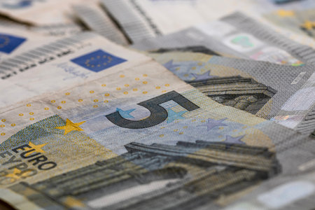 5 EURO banknotes. EUR money background representing savings, income, or investmentの写真素材