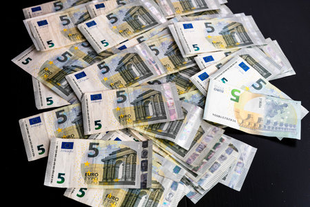5 EURO banknotes. EUR money background representing savings, income, or investmentの写真素材