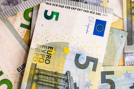 5 EURO banknotes. EUR money background representing savings, income, or investmentの写真素材