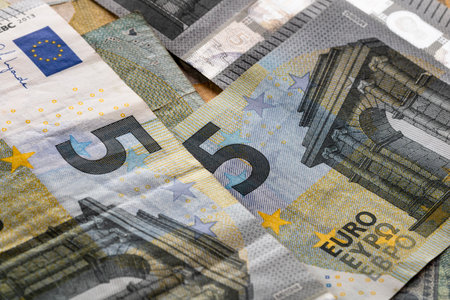 5 EURO banknotes. EUR money background representing savings, income, or investmentの写真素材
