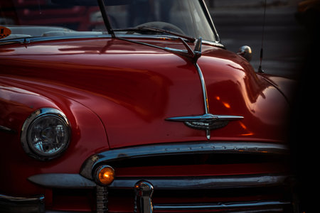 Vintage classic American car in Havana, Cuba. Typical Havana urban scene with colorful buildings and old carsの写真素材