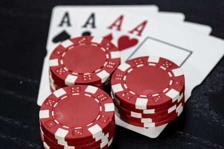 Casino chips and cards on the table. Poker gambling concept