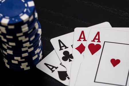 Casino chips and cards on the table. Poker gambling concept