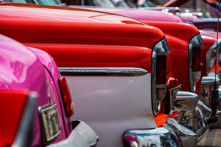 Vintage classic American car in Havana, Cuba. Typical Havana urban scene with colorful buildings and old carsの写真素材