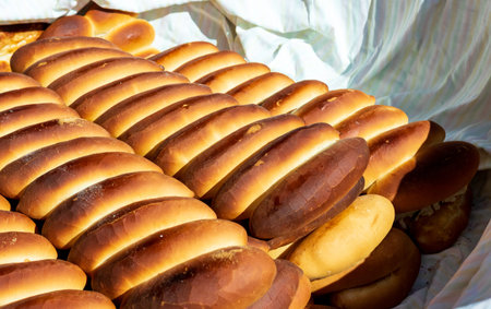 Fresh bakery bread in natural light. Small batch of baked bread