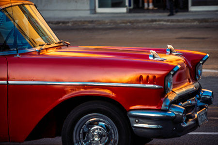 Vintage classic American car in Havana, Cuba. Typical Havana urban scene with colorful buildings and old carsの写真素材