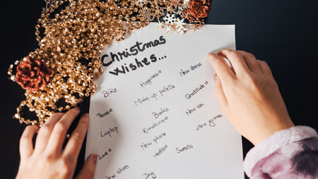 Creating a Christmas Wishes List â Writing Holiday Greetings, Festive Tradition Conceptの写真素材