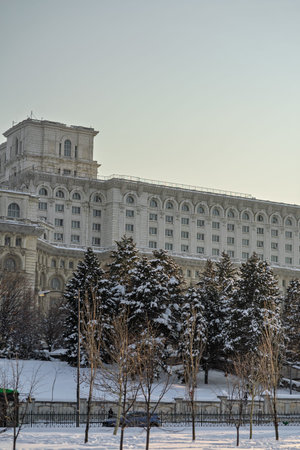 Large building of the Palace of the Parliament also known as People's House (Casa Poporului) in Constitutiei Square (Piata Constitutiei) in Bucharest, Romaniaの写真素材