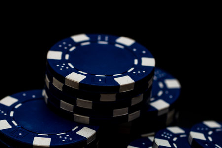 Detail of poker chips used for betting and wagering in a game of chanceの写真素材