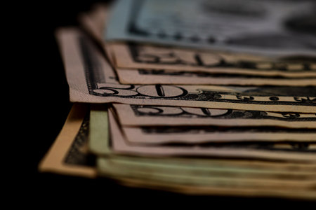 American Dollar banknotes representing economy and inflation in the United States. US dollar currency backgroundの写真素材
