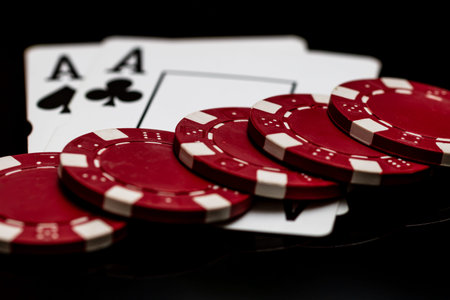 Winning poker hands with playing cards on a dark background for casino and entertainment themes
