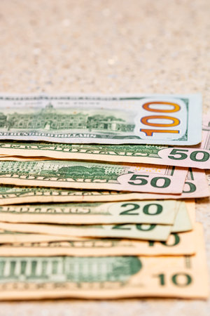 American Dollar banknotes representing economy and inflation in the United States. US dollar currency backgroundの写真素材