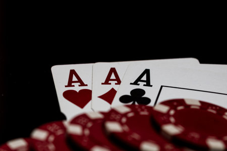 Winning poker hands with playing cards on a dark background for casino and entertainment themes
