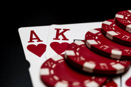 Winning poker hands with playing cards on a dark background for casino and entertainment themes