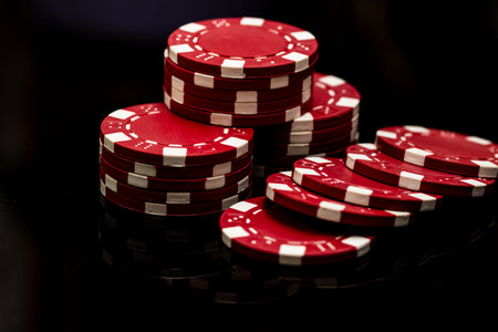 Detail of poker chips used for betting and wagering in a game of chance