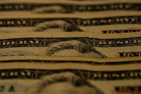 American Dollar banknotes representing economy and inflation in the United States. US dollar...