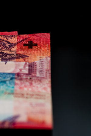 Close up detail of Swiss Franc banknotes representing economy and inflation in Switzerlandの写真素材
