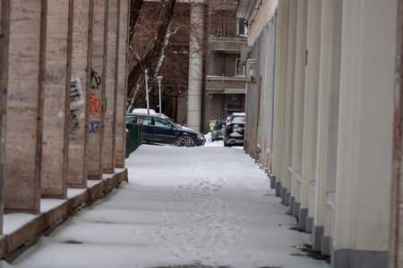 Morning traffic congestion with cars on snowy roads in Bucharest Romania during winterのeditorial素材