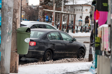 Morning traffic congestion with cars on snowy roads in Bucharest Romania during winterのeditorial素材