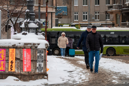 Morning traffic congestion with cars on snowy roads in Bucharest Romania during winterのeditorial素材