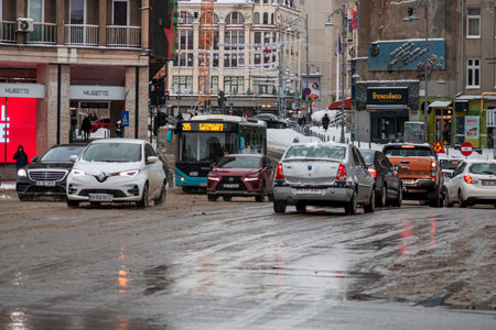 Morning traffic congestion with cars on snowy roads in Bucharest Romania during winterのeditorial素材