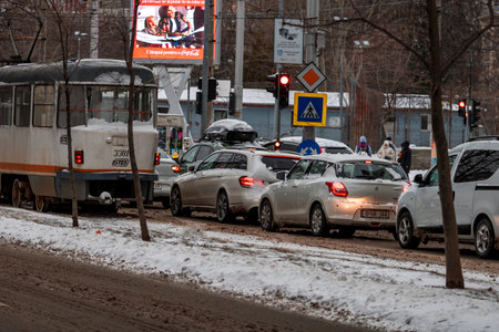 Winter morning commute with public transport STB vehicle on snowy roads in Bucharest Romania