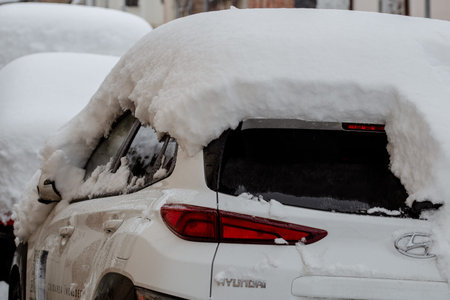 City covered in snow after a heavy snowfall. Urban scene during winterの写真素材