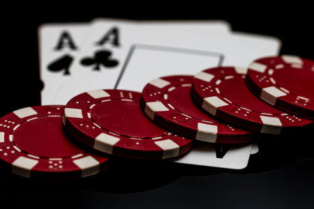 Winning poker hands with playing cards on a dark background for casino and entertainment themes