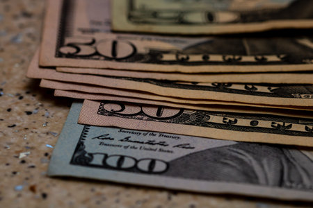 American Dollar banknotes representing economy and inflation in the United States. US dollar...