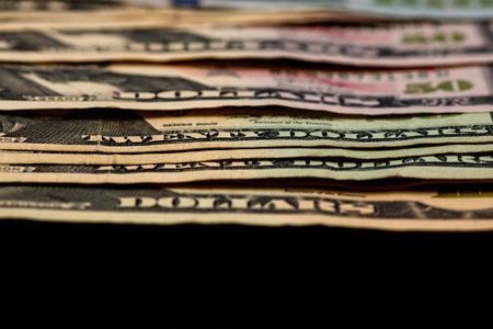 American Dollar banknotes representing economy and inflation in the United States. US dollar...