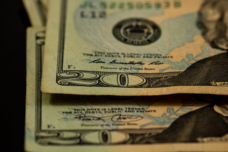 American Dollar banknotes representing economy and inflation in the United States. US dollar currency backgroundの写真素材