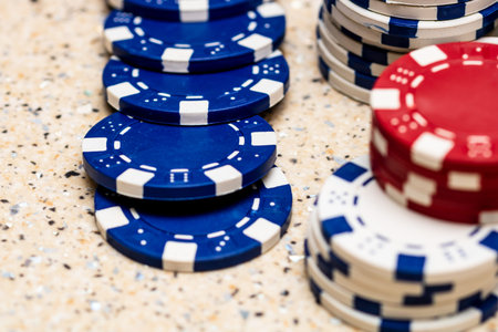 Detail of poker chips used for betting and wagering in a game of chance