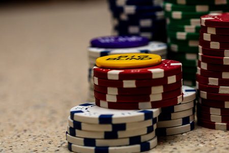 Detail of poker chips used for betting and wagering in a game of chance