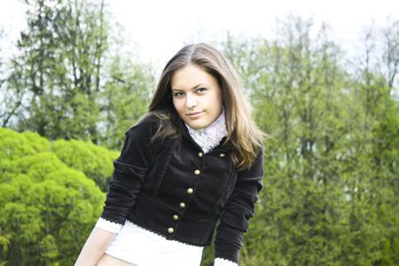 Smiling girl portrait outdoor in summer green parkの写真素材