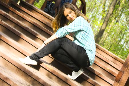 Smiling girl portrait outdoor in summer green parkの写真素材