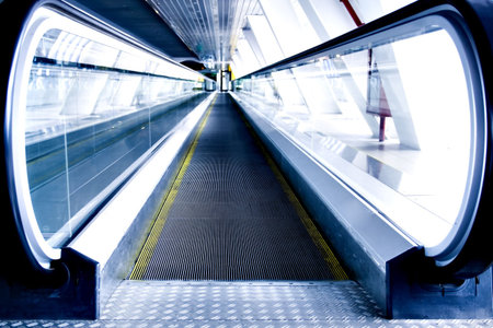moving escalator in the office hall perspective view
